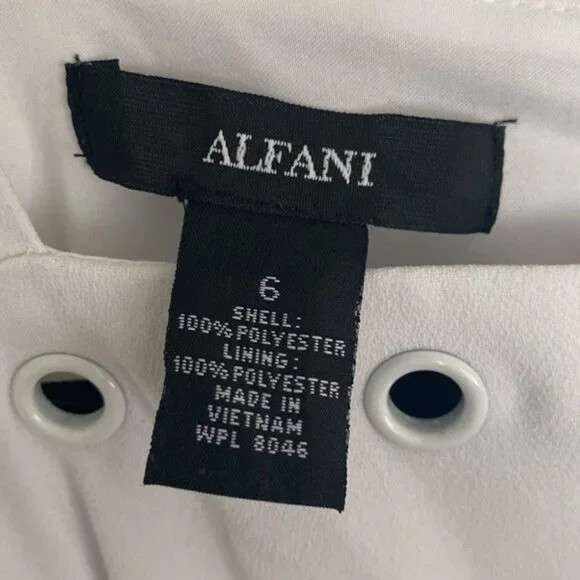 Alfani swing dress with white rivets on neckline. Size 6